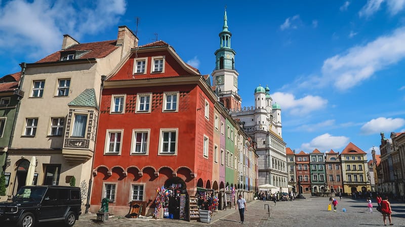 Your travel guide to the best things to do in Poznan, Poland with views of the old square on a bright sunny day Your travel guide to the best things to do in Poznan, Poland with views of the old square on a bright sunny day